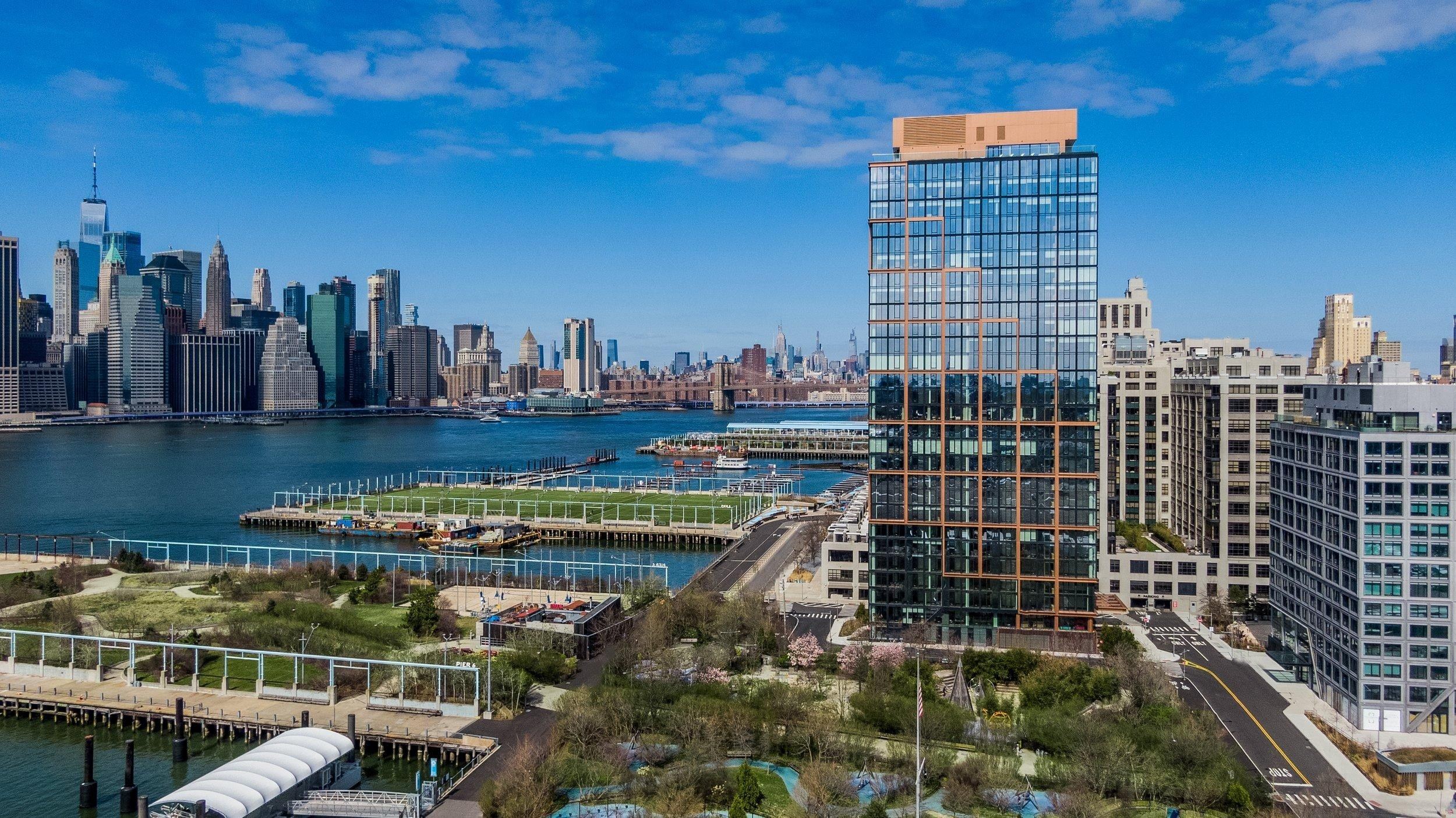 Quay Tower above Brooklyn Bridge Park, lower Manhattan beyond