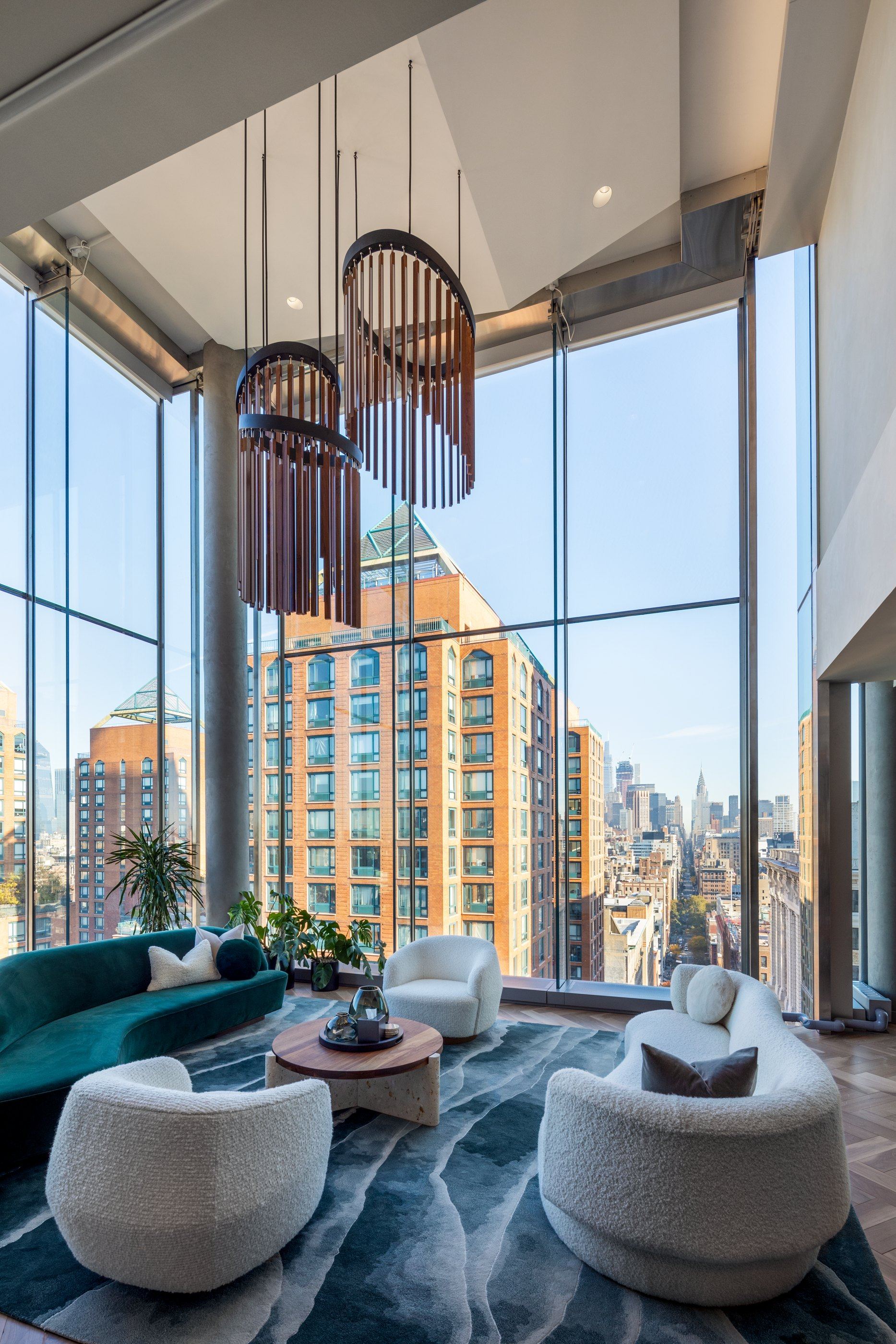 Double-height tenant lounge with city views